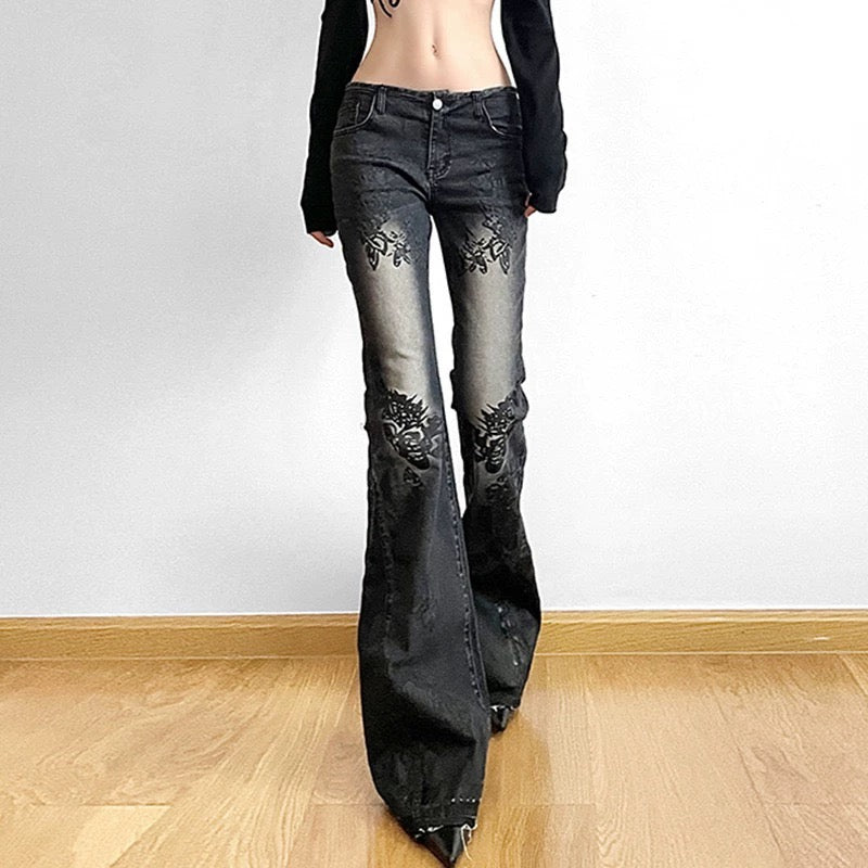 Gothic plant print detail on Y2K flare jeans, adding an edgy subculture twist