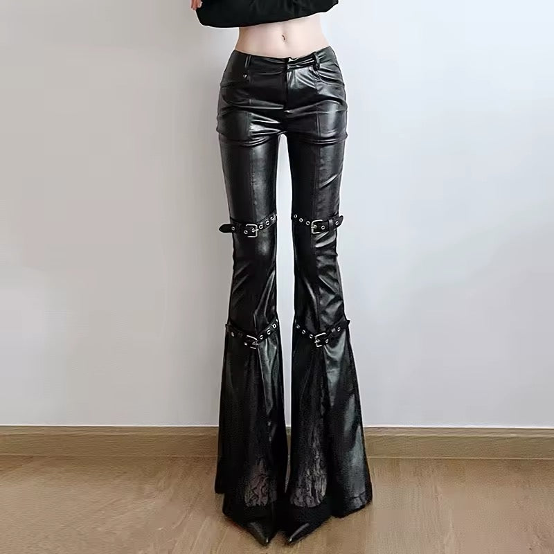 Punk-inspired black flare pants with gothic belt accents