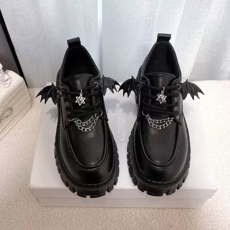 Gothic Mary Jane shoes with bat wings and patent leather finish, perfect for alternative and gothic outfits