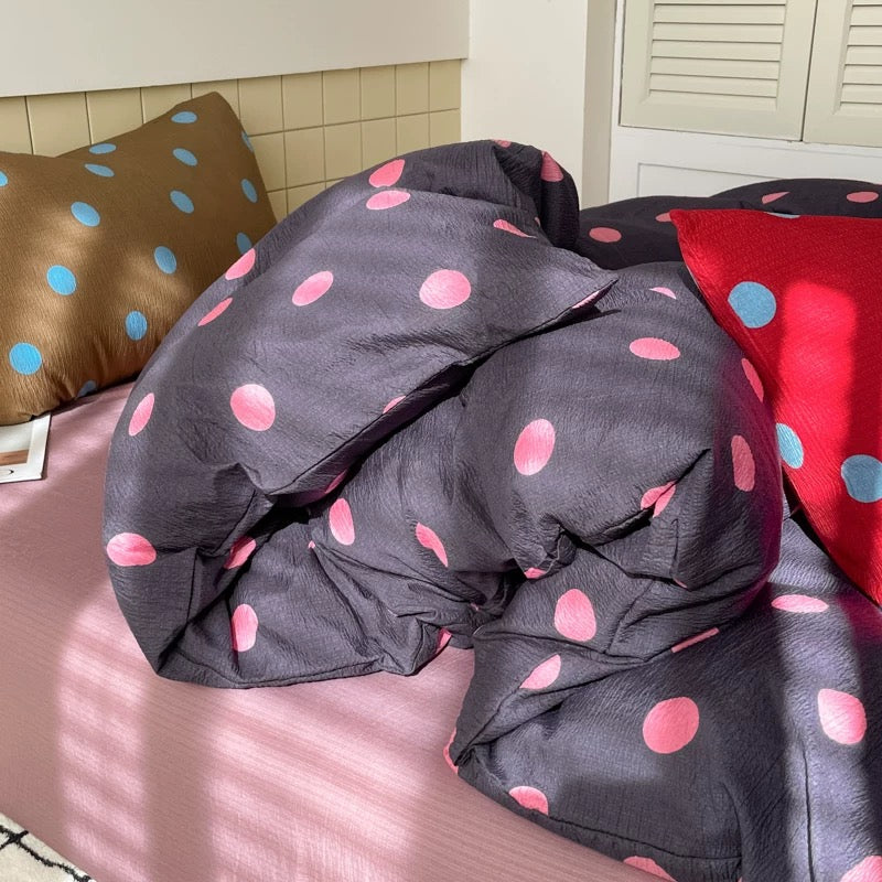 Color pop polka dot bedding bringing fun personality to small dorm room cozy preppy style