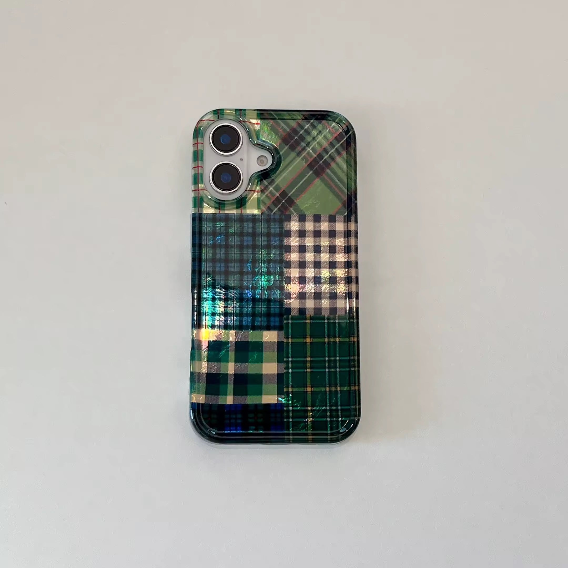 Glossy green checkerboard iPhone case styled with Y2K fashion