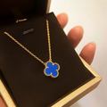 Gold clover pendant with lucky four-leaf design