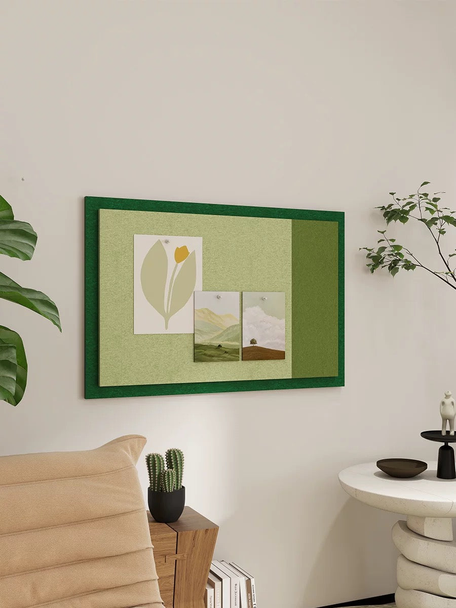 Green felt bulletin board with cream geometric color blocks
