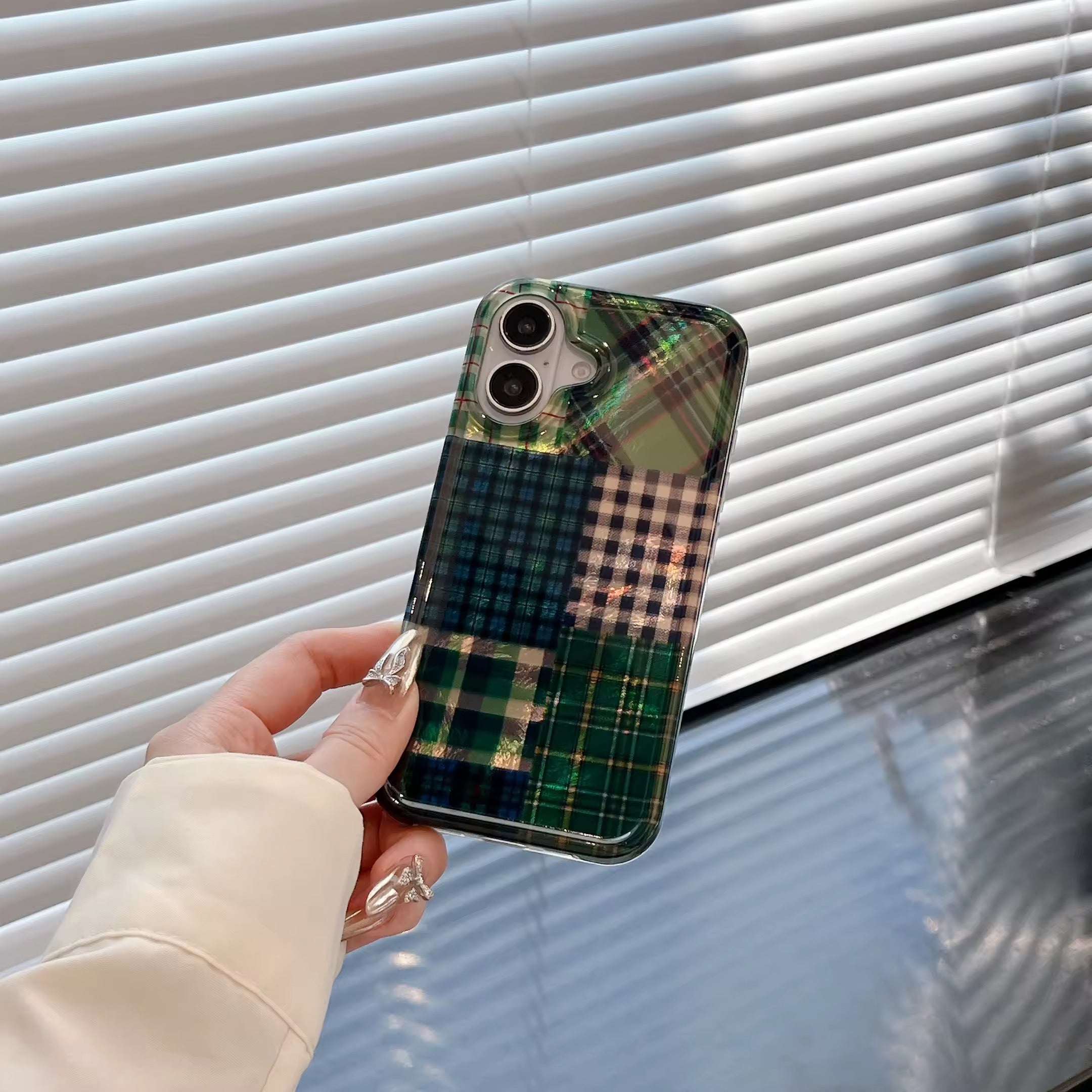 Close-up of retro patchwork green plaid iPhone cover
