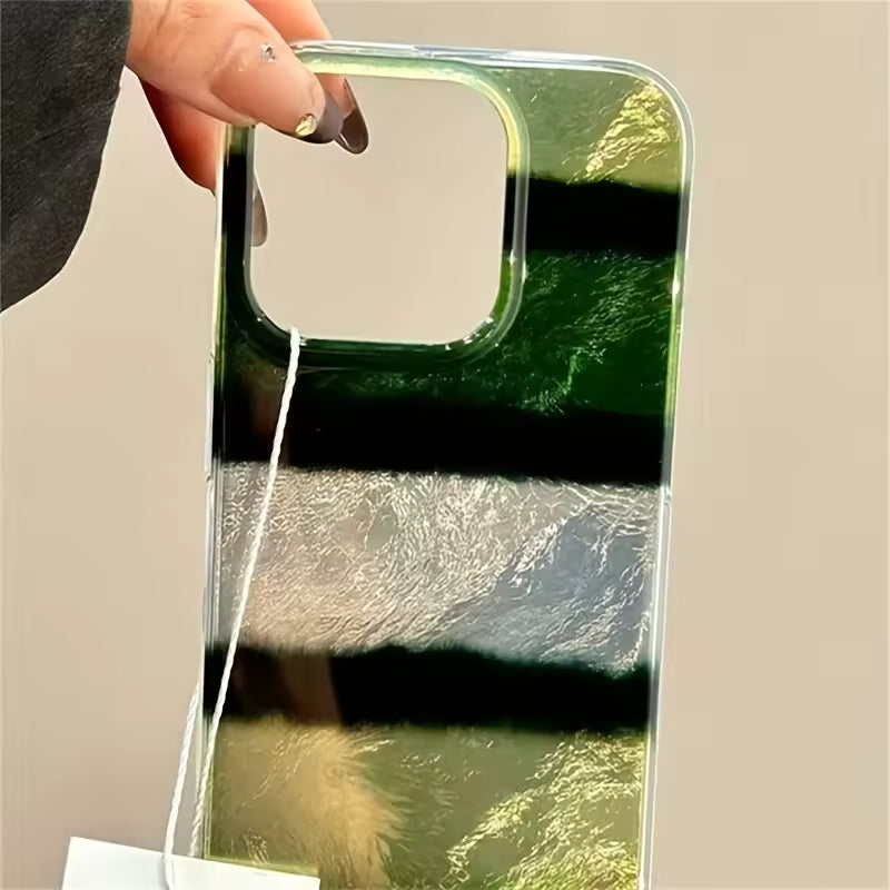 Clear phone case with gradient design held by a hand on a beige background