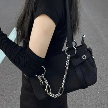 Black grunge shoulder bag with chain decor for a stylish look