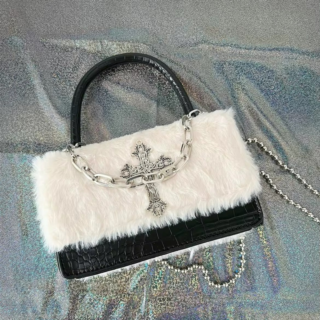 Y2K Gothic handbag with plush leather and cross applique. Grunge crossbody bag with chain strap for women’s Harajuku-inspired style.