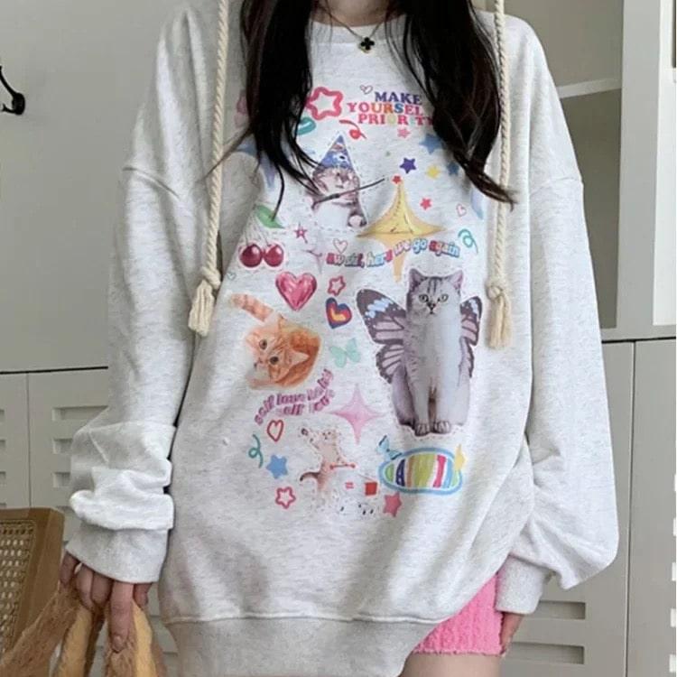 Grunge kawaii cat hoodie in a cozy oversized design for winter