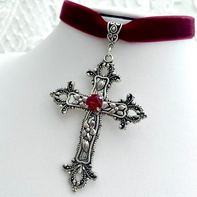Elegant black velvet choker with silver cross and crystal accents. Gothic aesthetic necklace for women and men.