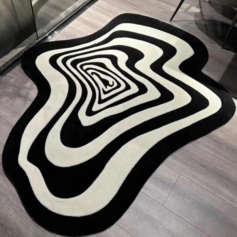 Hand-tufted wool area rug with irregular blob design