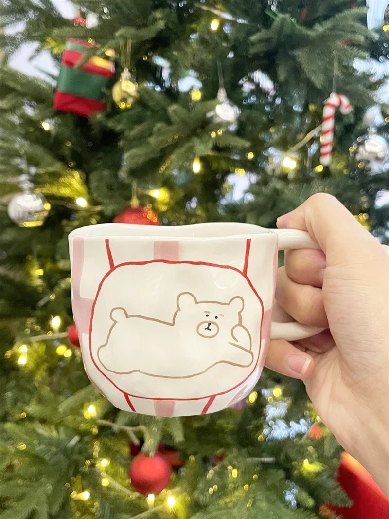 Handmade ceramic bear mug for cozy coffee mornings.