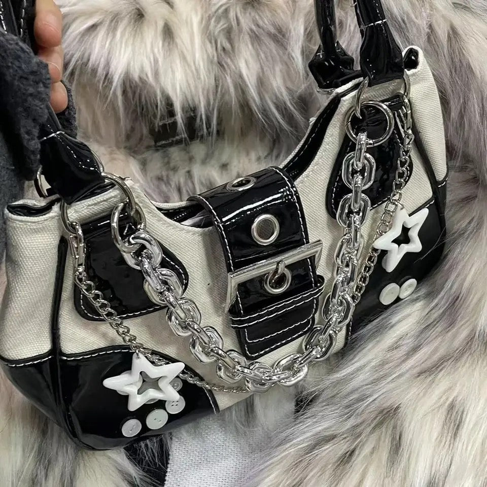 White Goth Y2K bag with patent leather design, chain detail, and adjustable strap. Harajuku-inspired tote with large capacity for daily use.