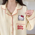 Pink plaid Hello Kitty pajamas for sleep and lounging