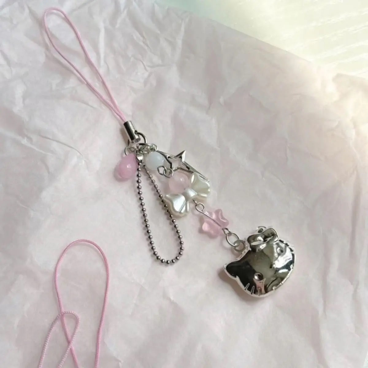 Cute Hello Kitty phone charm, perfect for phones and keys