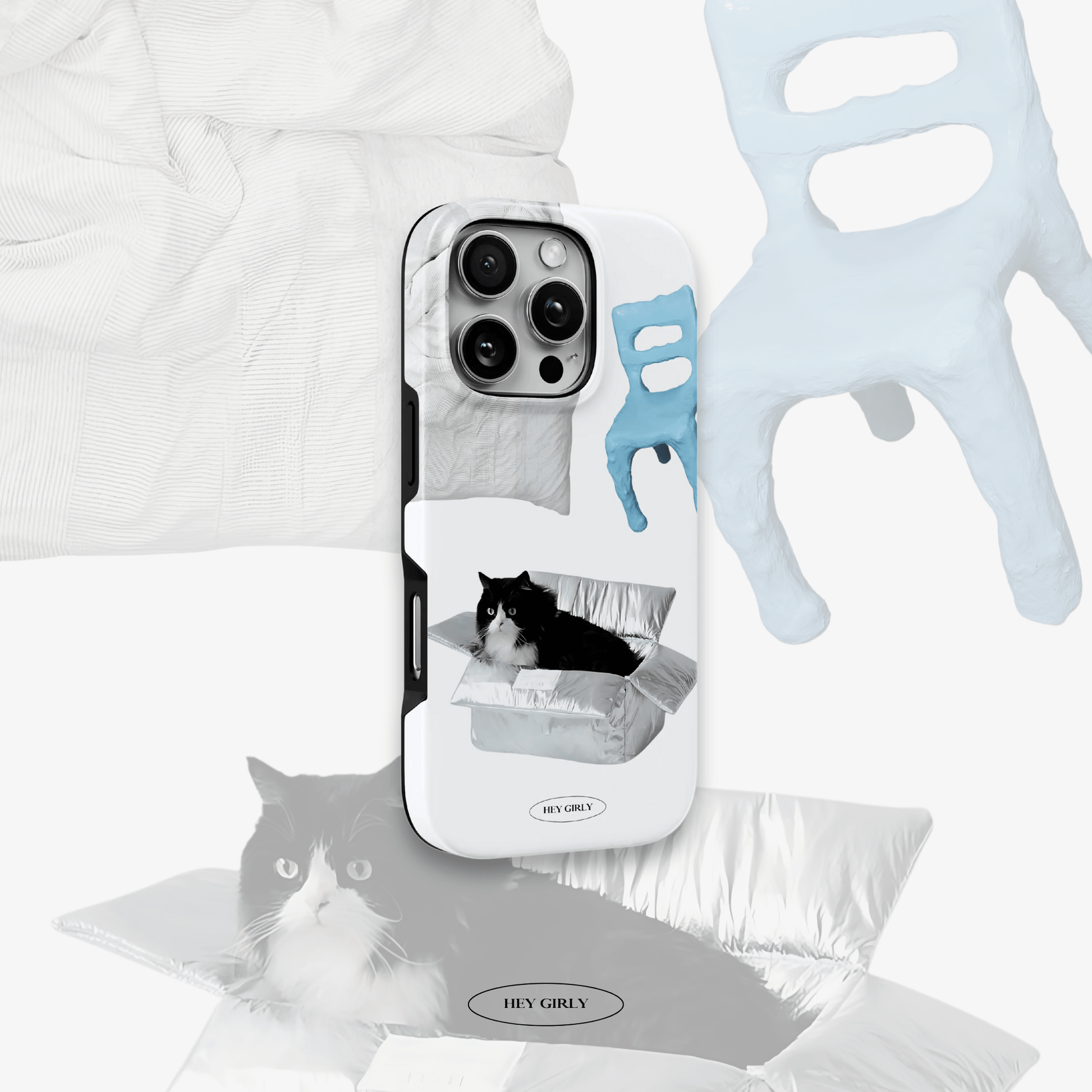 Phone case with cat design, gloves, and cat toy on a white background
