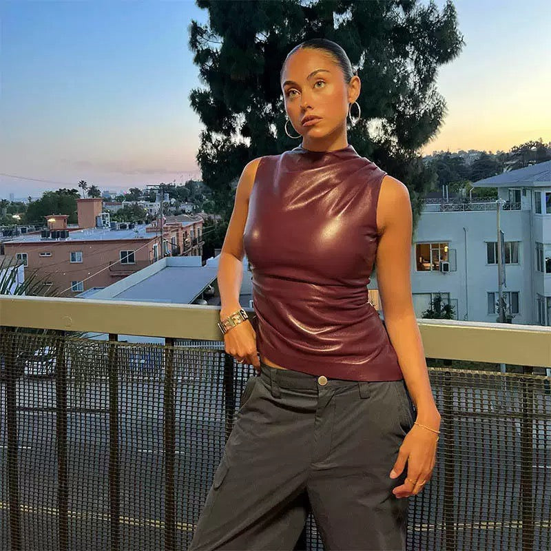 Ruched sleeveless crop top in glossy burgundy leather