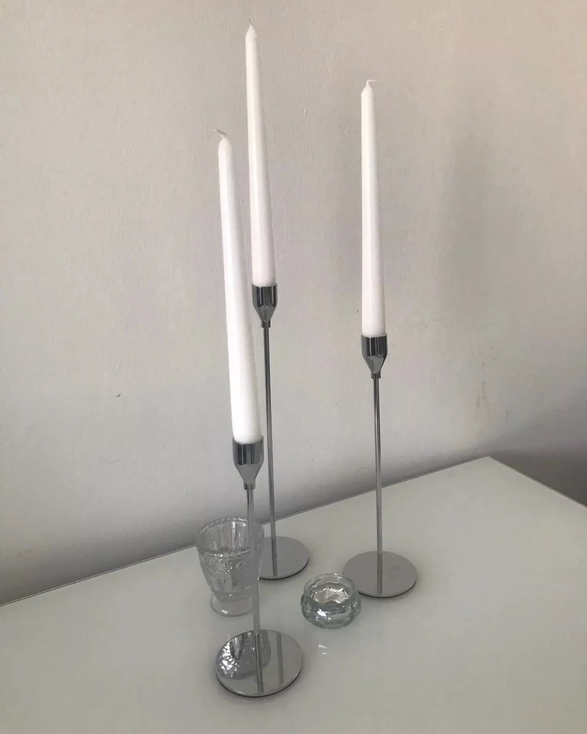 Minimalist metal candle holder with tapered design