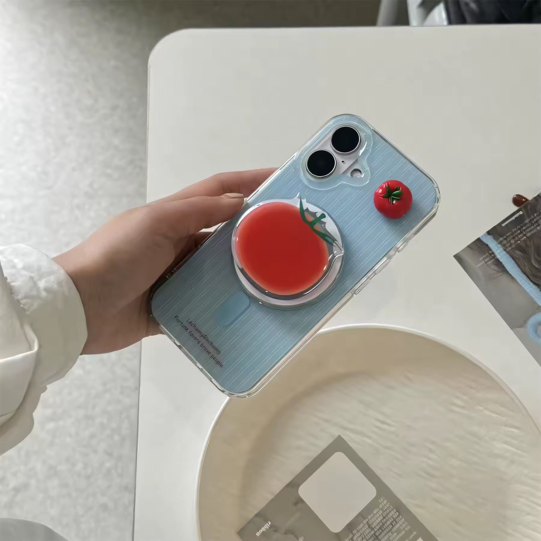 Aesthetic phone case for iPhone with fun tomato detail.