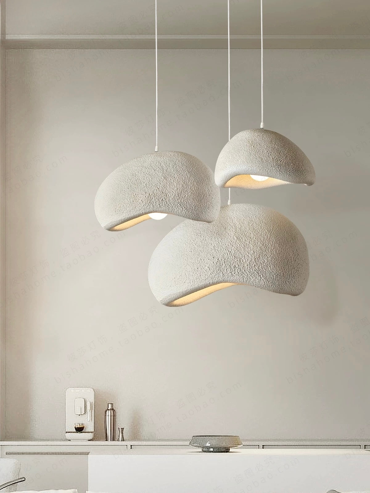 Minimalist chandelier with natural materials and organic form