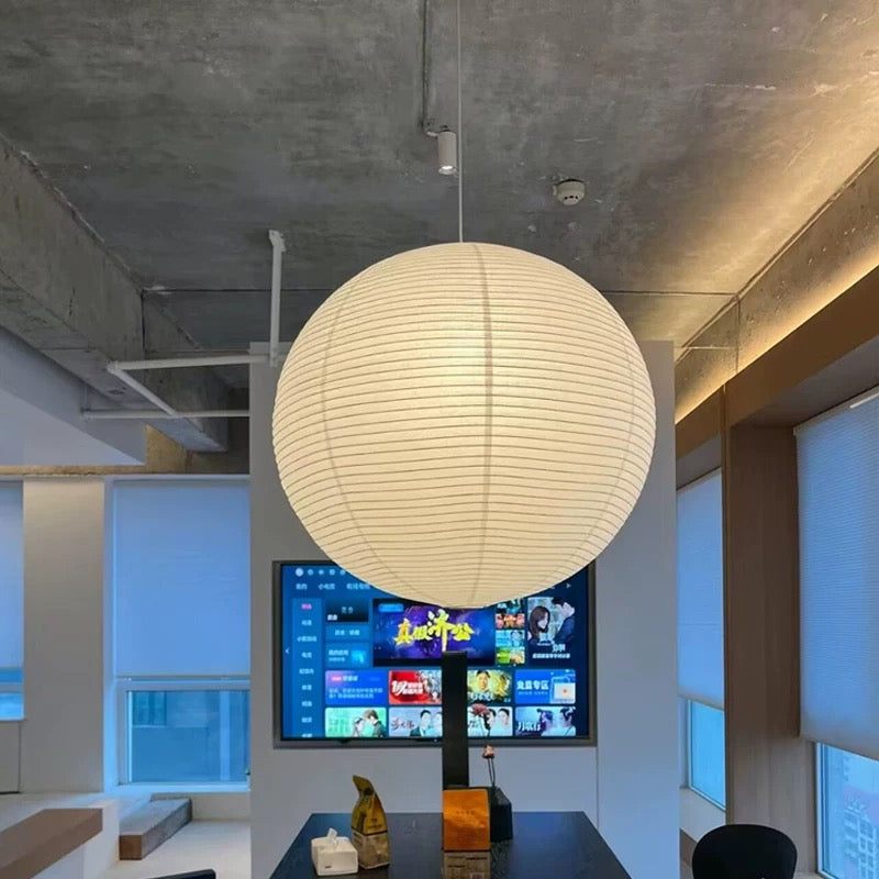 Soft glow rice paper ceiling lamp with Noguchi-style paper shade, a calming addition to Japanese-inspired modern interiors