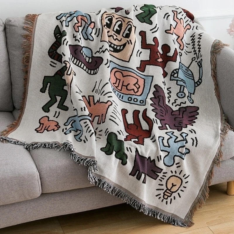 Jigsaw puzzle throw blanket with jacquard weaving and tassels