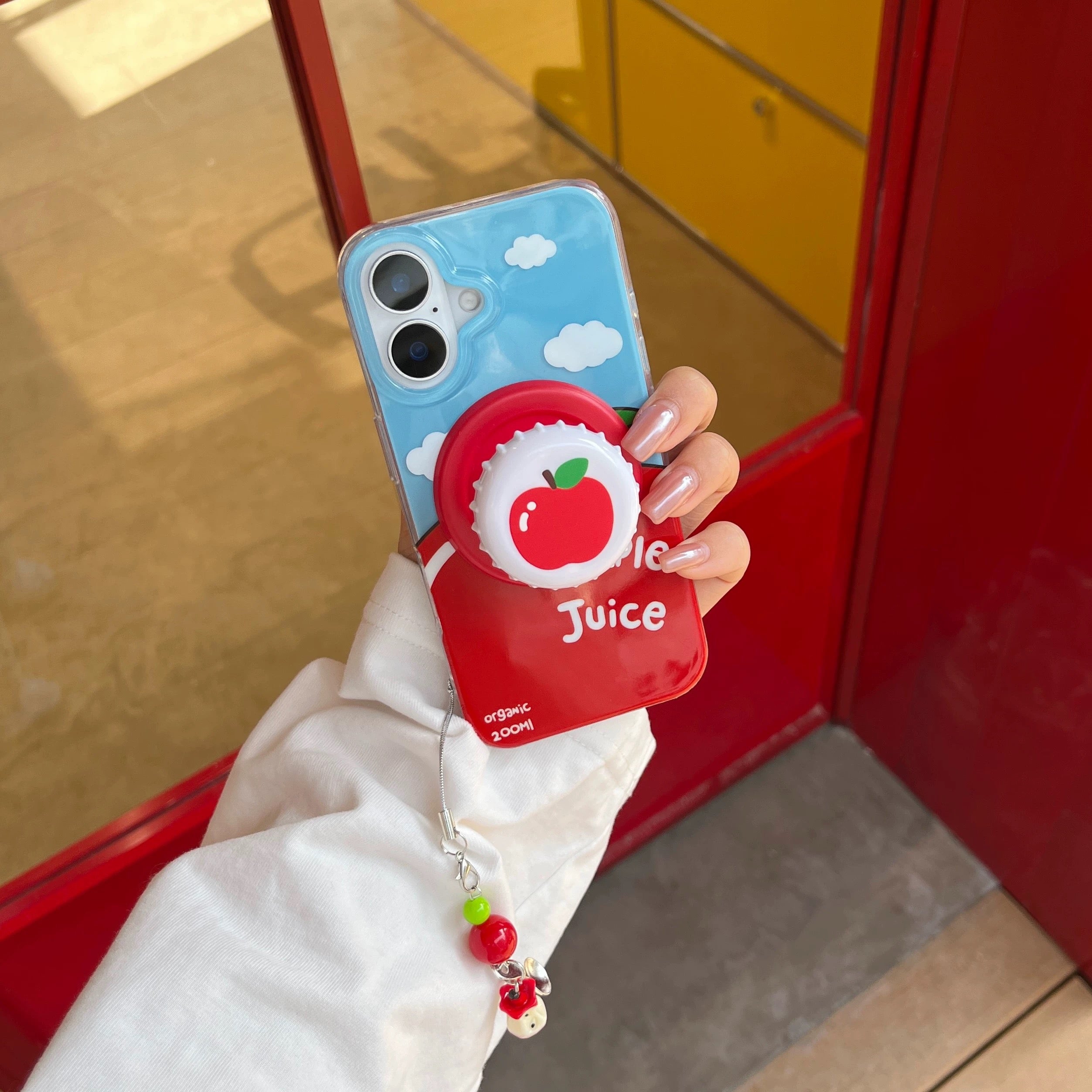 Kawaii Apple Juice MagSafe iPhone case with bottle cap grip. Cute fruitcore aesthetic Apple Juice phone case for iPhone 15 Pro Max.