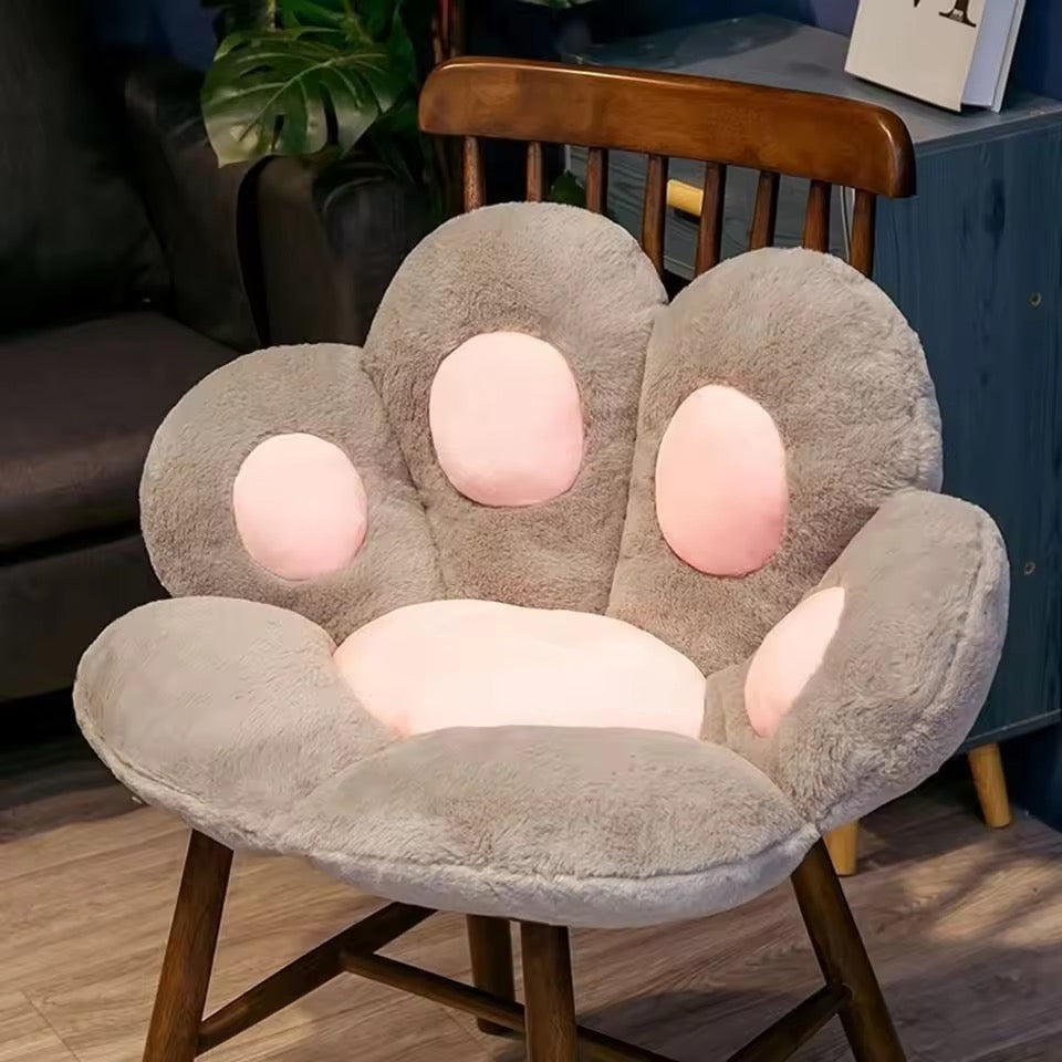 Chair with paw-shaped cushion in a room setting