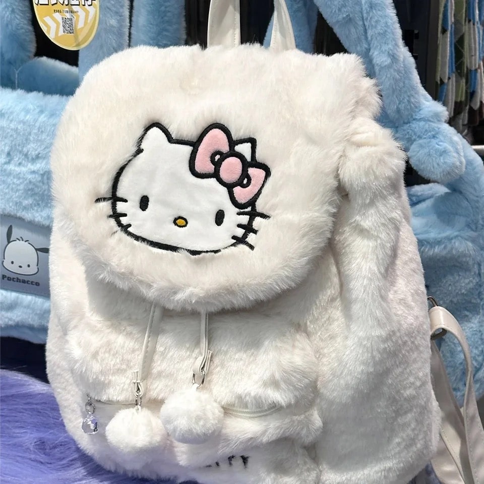 Adorable Hello Kitty plush backpack in pink and white on white background