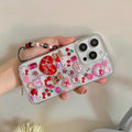 Cute Y2K Hello Kitty iPhone case with glitter effect