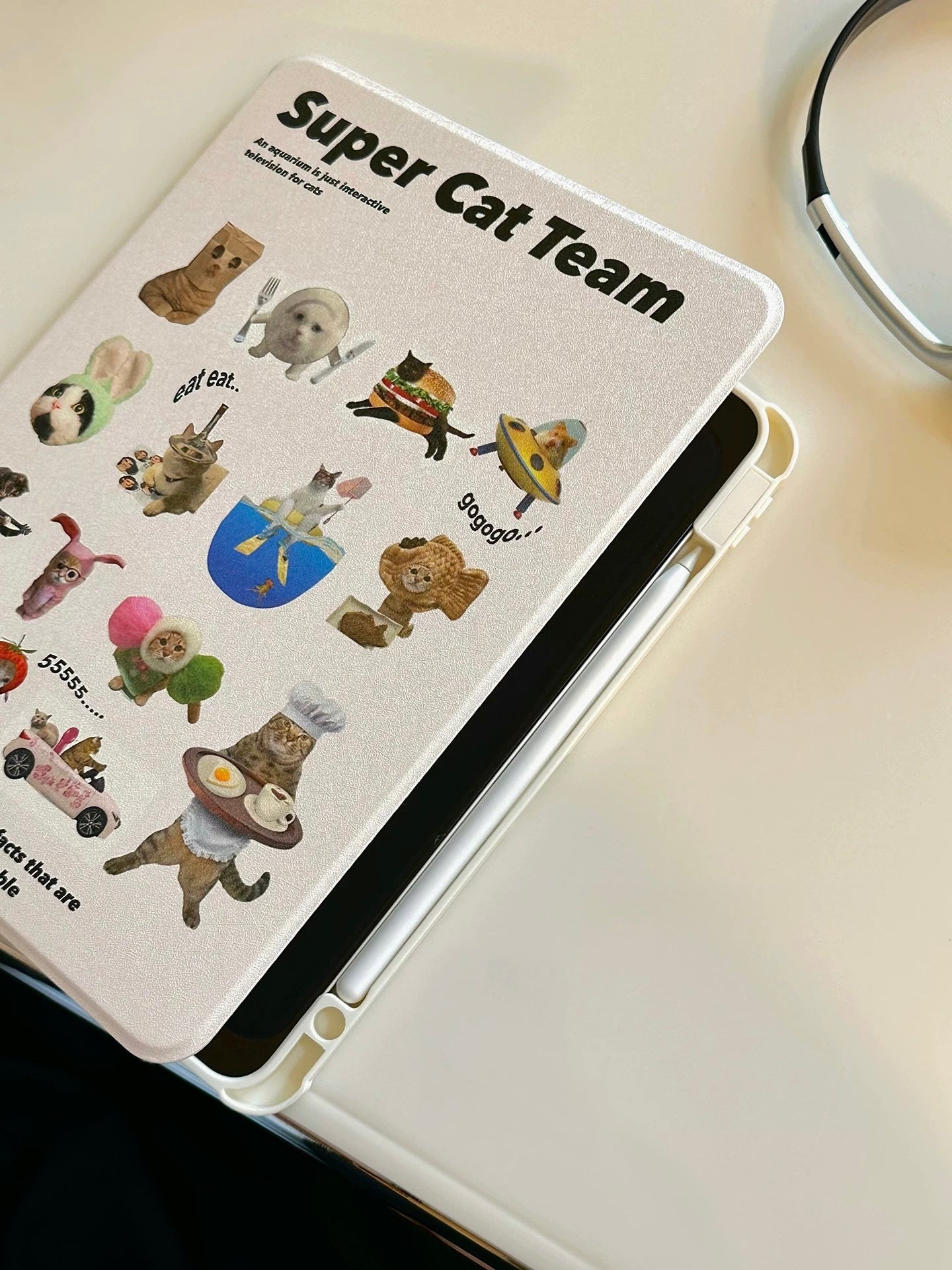 Durable iPad case with cat chef and pink cotton candy kitten.