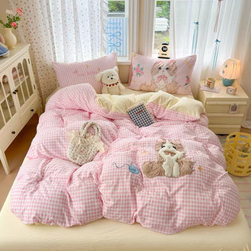 Kawaii kitty pink gingham bedding set with embroidered cat detail for soft girl rooms.