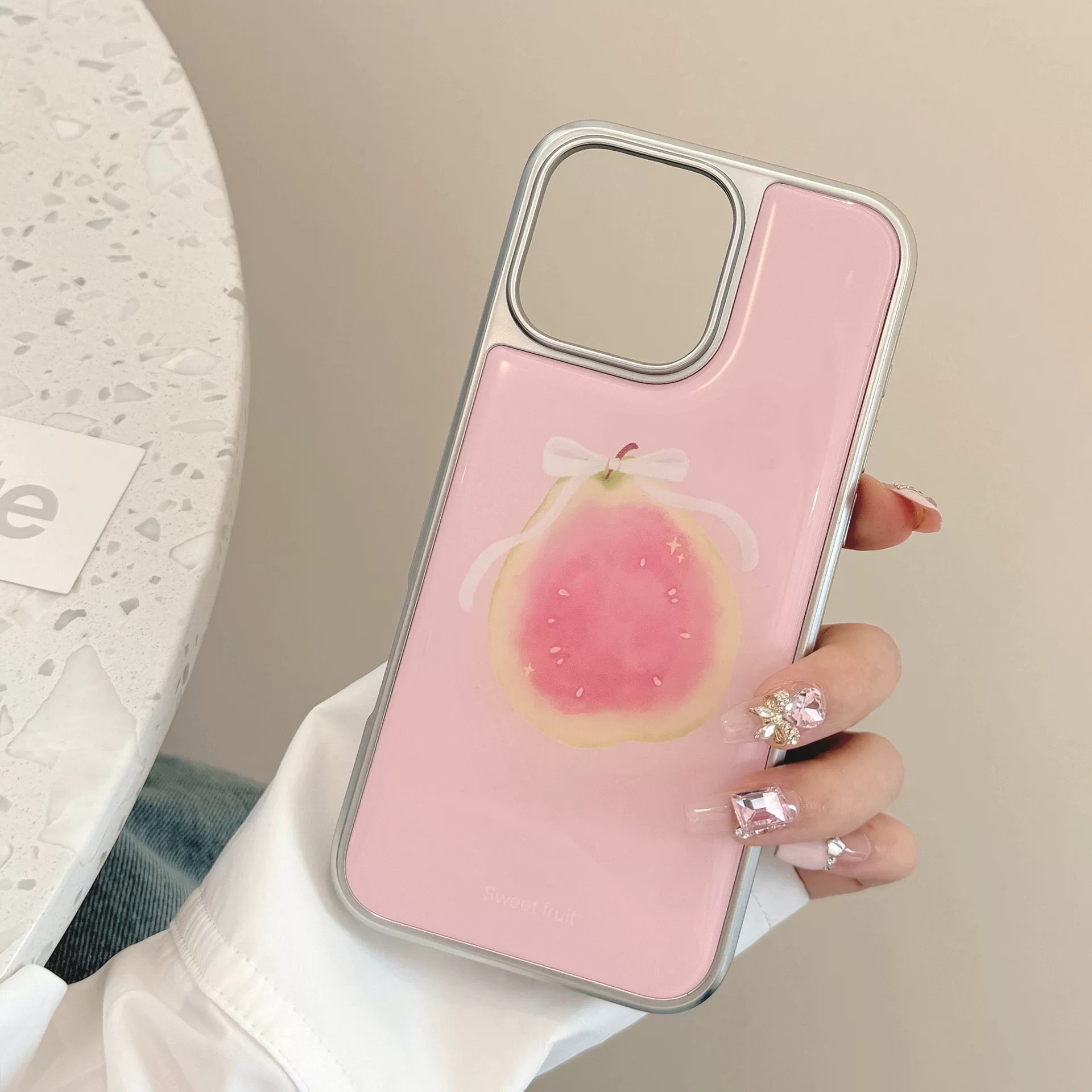 Korean soft girl pastel iPhone case with pink guava and white bow illustration, aesthetic tech accessory.