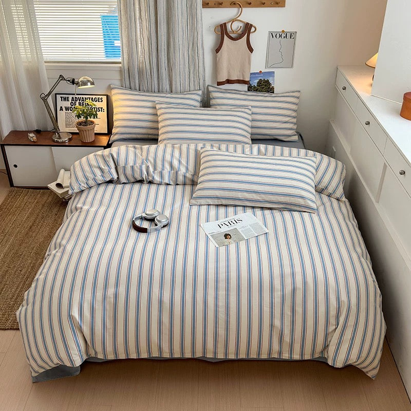 Cozy Korean-style bed setup with breathable striped bedding