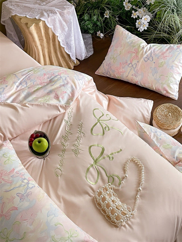 Floral and decorative pillow with embroidery on a bed