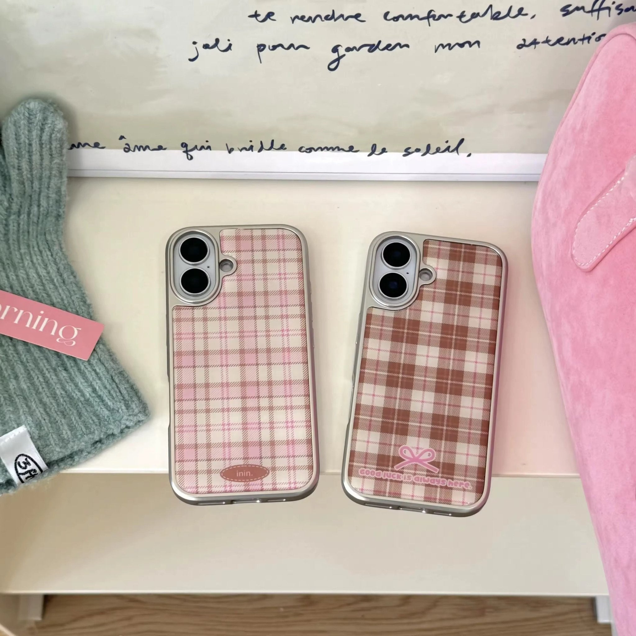 Close-up of Korean plaid iPhone case with brown checkered leather design and soft girl gloves