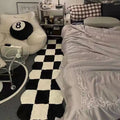 Stylish Korean-style checkered rug in black and white, ideal for bedroom