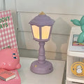 Cozy night light with vintage street lamp design.