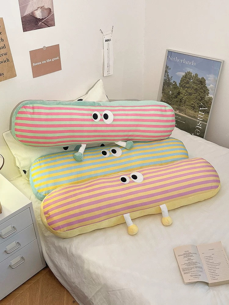 Long pillow with cartoon eyes for side sleeper support