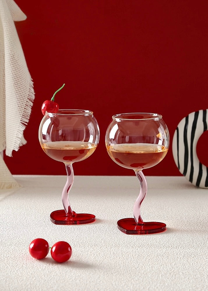 Romantic wine goblet with heart base designed for valentine gifts and date nights
