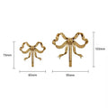 Solid brass coat hook in bow shape for wardrobe use