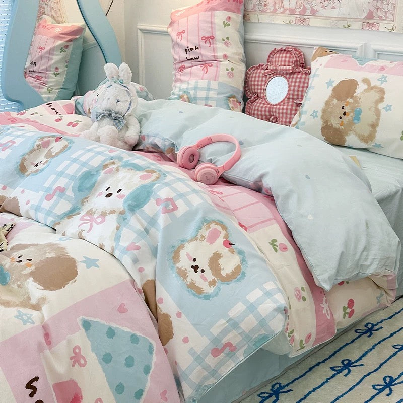 Overhead shot of the complete Kawaii Puppy Bedding Set on a neatly made bed.