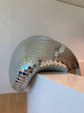 Melting disco ball decor for retro vibe