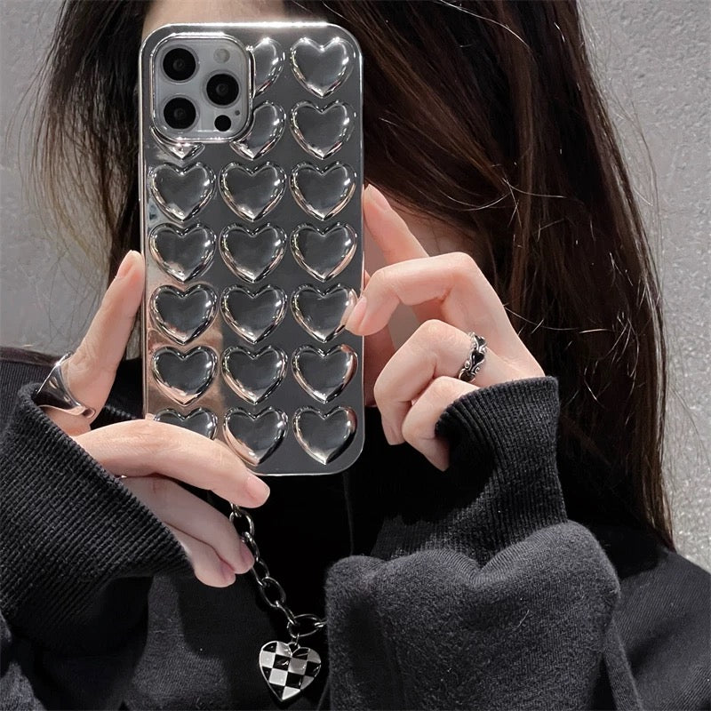 Y2K aesthetic metallic heart case showcasing a luxury design