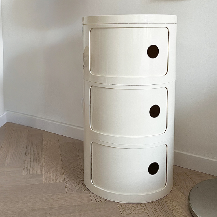 Modern pink bedside cabinet for multifunctional use