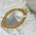 Golden tray with handles, perfect for table decor