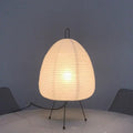 Noguchi-inspired Akari lamp with rice paper shade and tripod stand