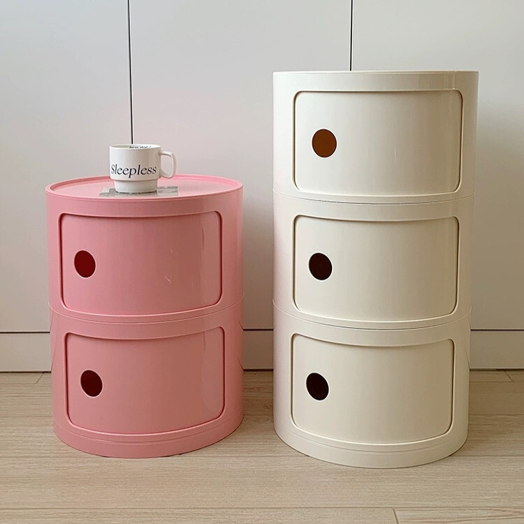 Nordic pink bedside cabinet with 4 drawers and oval design