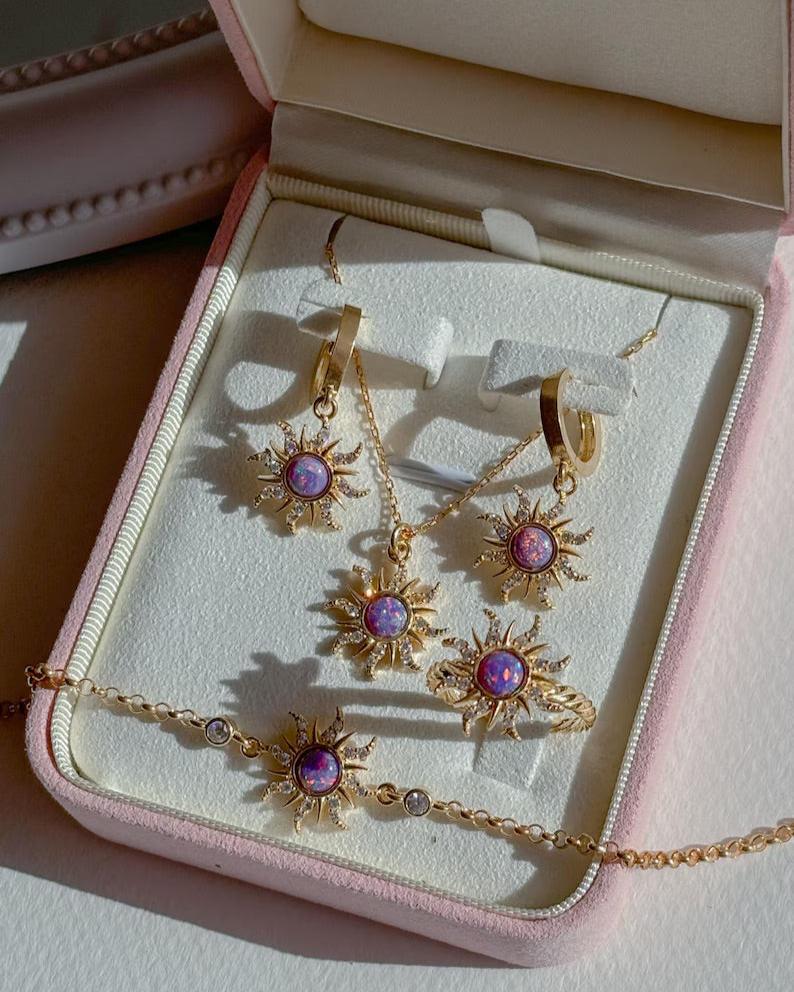 Sun-inspired jewelry set with purple opal stones