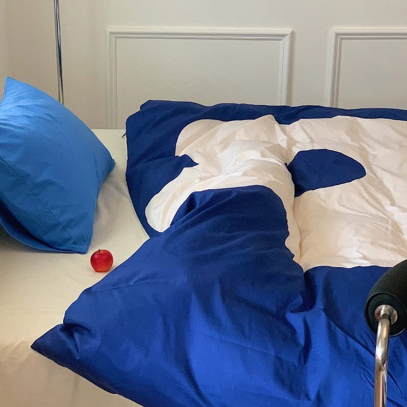 Modern soft room featuring cotton floral comforter