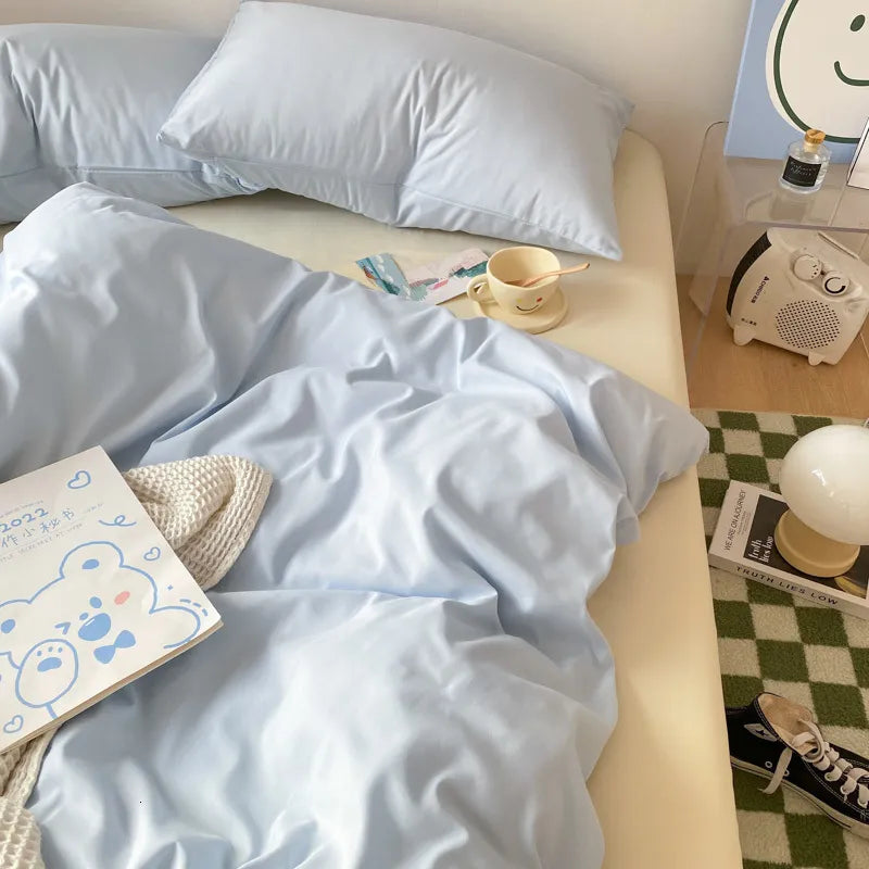 Cozy cream and pastel blue bed linen set styled for TikTok-ready rooms.